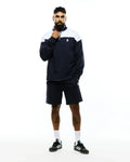 Navy French terry quarter-zip sweatshirt with white color block and embroidered Psycho Bunny skull logo, paired with matching Mens Gabe French Terry Sweatshort featuring an embroidered bunny skull.