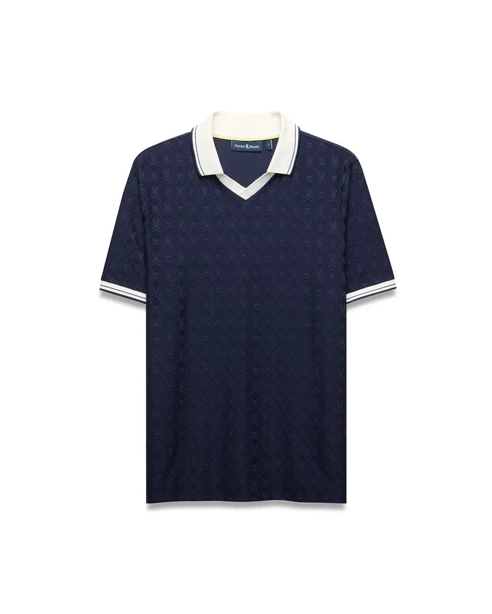 Mens Garry Jacquard Johnny Collar Polo in navy with an all-over bunny skull jacquard pattern, white Johnny collar, and ribbed cuffs with white stripes. Classic fit.