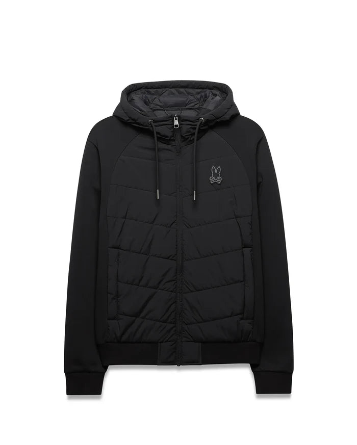 Mens Gordley Mix Media Jacket. Black hooded full-zip jacket featuring a quilted front panel, smooth raglan sleeves, ribbed cuffs and hem, with a small embroidered Psycho Bunny skull logo on the left chest.