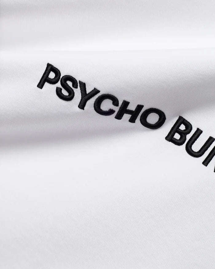 White Mens Haiden Relaxed Heavy Weight Tee, a heavy jersey knit, featuring prominent black embroidered PSYCHO BUNNY text diagonally across the front.