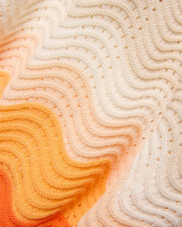 Mens Holden Knit Short 6 featuring a vibrant orange to peach to white gradient, crafted from a unique wavy knit fabric with subtle perforations, offering a refined streetwear aesthetic.