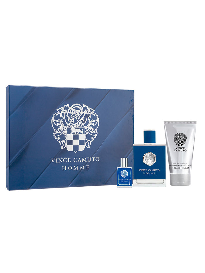 The Vince Camuto Men’s Homme 3-Piece Set features a blue box, a cologne bottle, a travel spray, and a tube of body lotion—all adorned with the brand’s crest and white lettering. Infused with invigorating notes of pressed citron and blue cypress, this sophisticated set embodies the fresh elegance of Homme.