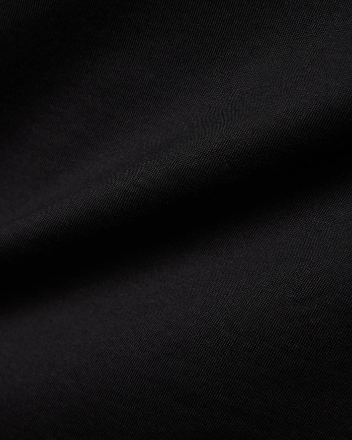 Mens Jaydon Wordmark Graphic Tee in classic black, crafted from soft jersey knit fabric with a subtle diagonal texture, featuring a bold wordmark graphic.