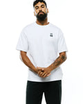 Mens Jaydon Pima Cotton Oversized-Fit Tee, a white smooth Pima cotton jersey t-shirt featuring a small black embroidered Psycho Bunny skull logo on the left chest.
