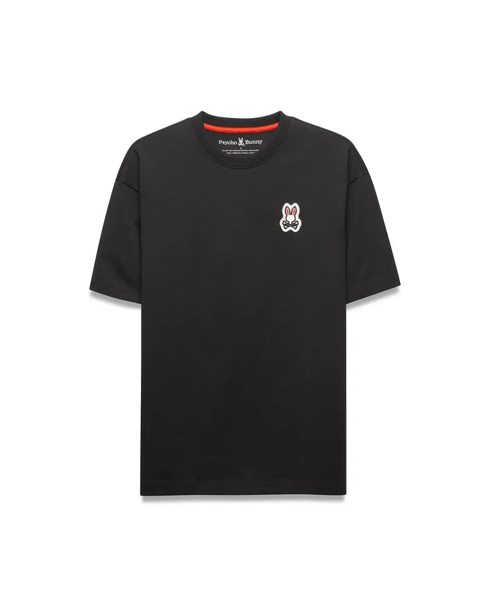 Black Mens Jaydon Relaxed Fit Tee with a red inner neckline, featuring a small embroidered white, red, and black Psycho Bunny skull logo on the left chest. Soft jersey knit, relaxed fit.