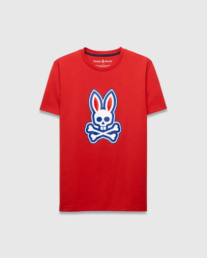 Mens John Graphic Tee, a vibrant red classic fit jersey knit t-shirt, showcasing a prominent centered white and blue Psycho Bunny skull logo graphic.