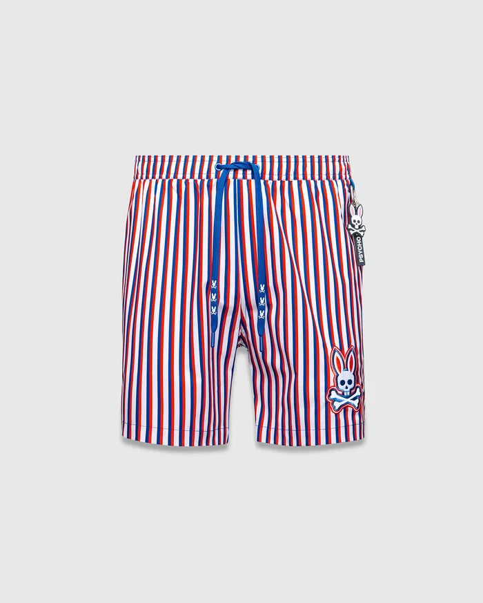 Mens John All Over Print Swim Trunk, red, white, blue vertical stripes, blue drawstring with mini bunny skulls, large embroidered Psycho Bunny skull logo on left leg, and Psycho Bunny tag.