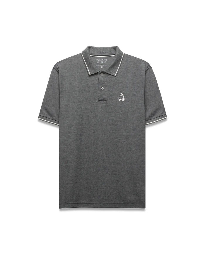 Mens Joji Performance Polo, dark grey heathered pique knit polo with classic fit, featuring a small white embroidered Psycho Bunny skull logo on the left chest and white striped ribbed collar and cuffs.