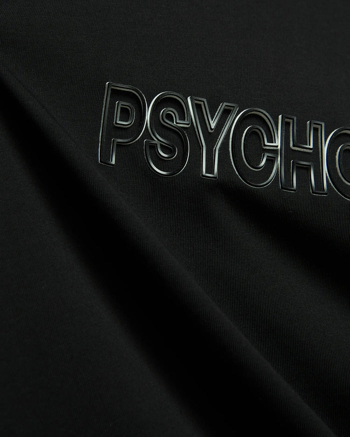Black Mens Joji Wordmark Graphic Tee crafted from smooth jersey knit, showcasing a prominent, raised, glossy silver-outlined PSYCHO wordmark graphic across the chest.