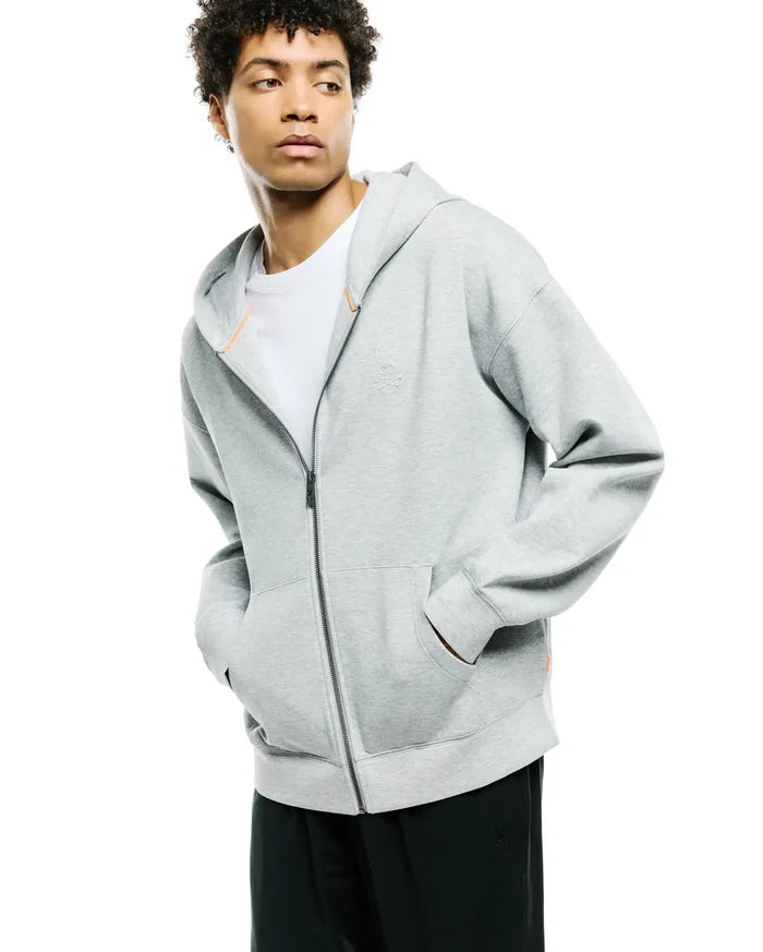 Mens Jonathan Zip Hoodie, a relaxed fit heather grey french terry full-zip hoodie featuring a subtle tone-on-tone embroidered Psycho Bunny skull logo on the left chest and orange zipper lining.
