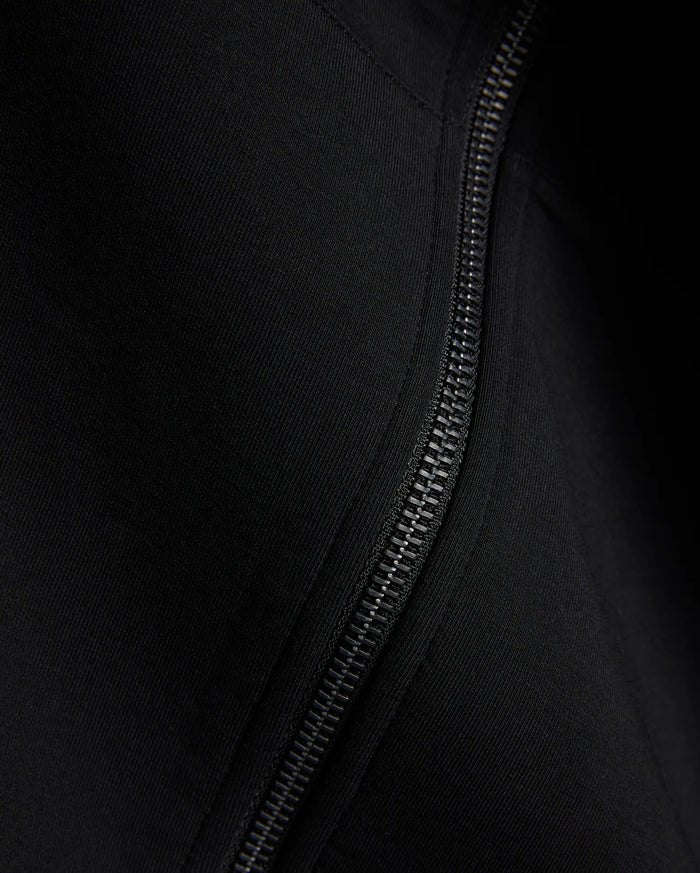 Black Mens Jonathan Zip Hoodie, a premium streetwear piece crafted with a sleek black zipper and a fine, subtle diagonal ribbed knit texture.