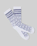 Mens Kace Bunny Pattern Sport Sock, white knit with an all-over navy bunny skull pattern, featuring a ribbed cuff with navy stripes and a prominent navy Psycho Bunny text logo.