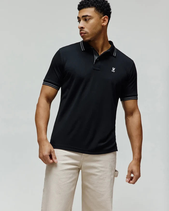 Mens Kenyon Lightweight Pique Polo, black classic fit with white double-stripe tipping on collar and cuffs, featuring a small embroidered white Psycho Bunny skull logo on the left chest.