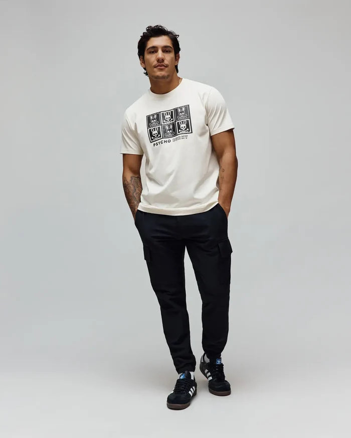 Mens Keon Graphic Tee, ecru classic fit jersey t-shirt with a large black chest graphic featuring a grid of Psycho Bunny skull logos and Psycho Bunny text.
