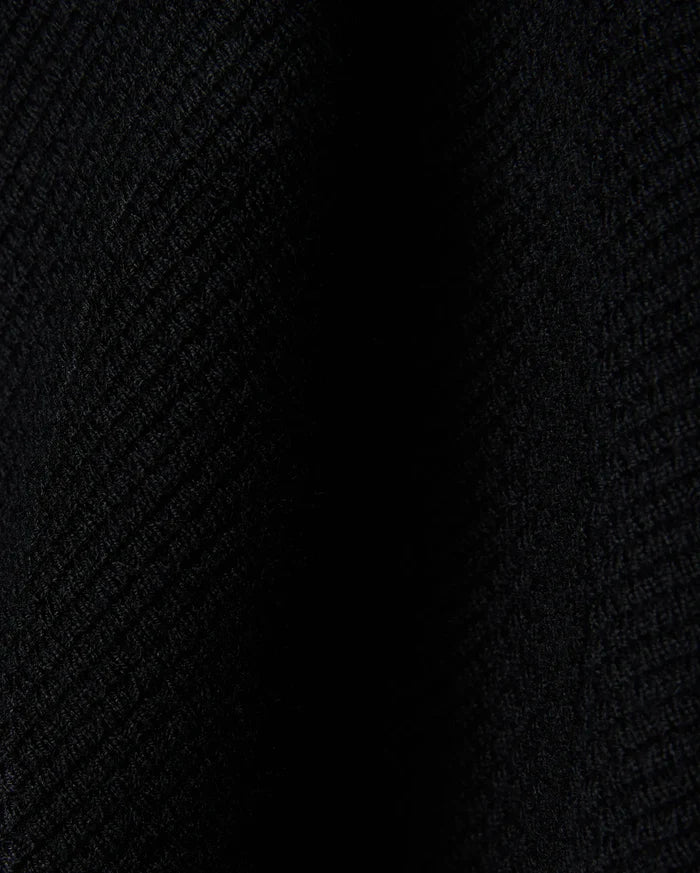 Black Mens Leroy Long Sleeve Knit Polo by Psycho Bunny, featuring a premium, subtly textured knit fabric with a refined, dense weave, perfect for sophisticated streetwear.