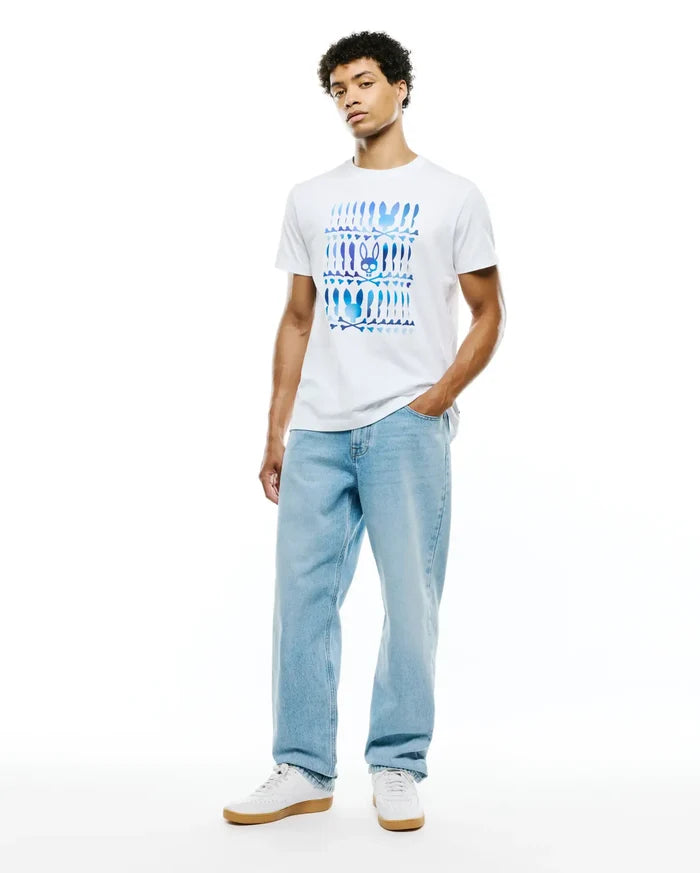Mens Lewis Graphic Tee, a classic fit white jersey t-shirt featuring a large chest graphic of repeating blue and purple gradient Psycho Bunny skull and crossbones motifs.