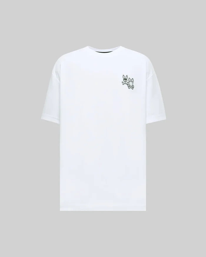 White Mens Luke Back Graphic Tee, a relaxed fit jersey t-shirt with a small, dark green embroidered Psycho Bunny logo depicting two bunny skulls and crossbones on the left chest.