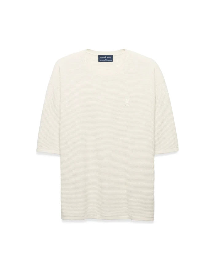 Mens Makai Textured Knit T-Shirt in cream, featuring a relaxed fit, subtle horizontal textured knit, and a small tonal embroidered Psycho Bunny skull logo on the left chest.