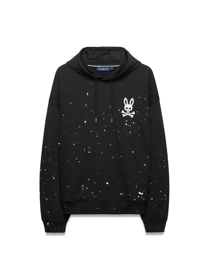 Mens Malcom Splatter Hoodie, black relaxed fit French terry hoodie with a vibrant teal, white, and dark blue splatter print, featuring a large white Psycho Bunny skull logo on the left chest and drawstring hood.