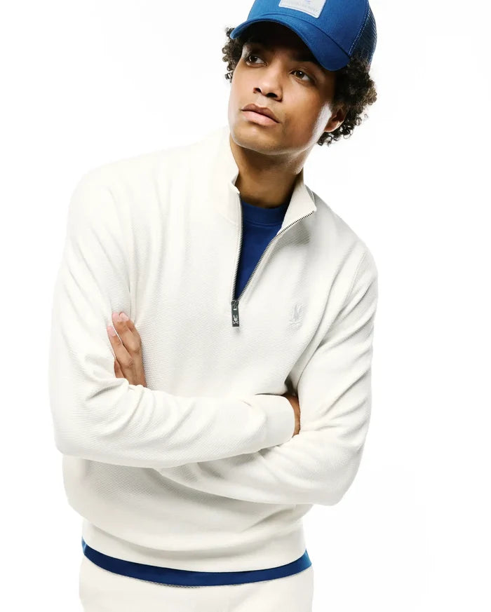 Mens Marc Textured 1/4 Zip in cream, featuring a classic fit, textured waffle knit fabric, a silver 1/4 zip closure with a dark Psycho Bunny logo pull, and a tonal embroidered left chest logo.