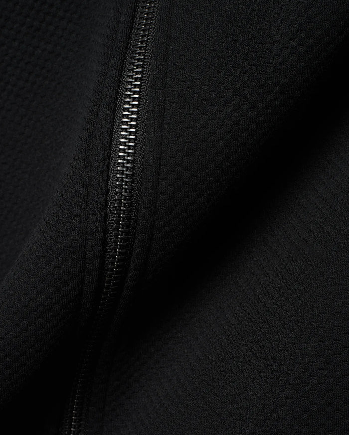 Mens Marc Textured Full Zip Hoodie in deep black, showcasing its refined waffle knit fabric texture and a sleek, dark metallic full-length zipper detail.
