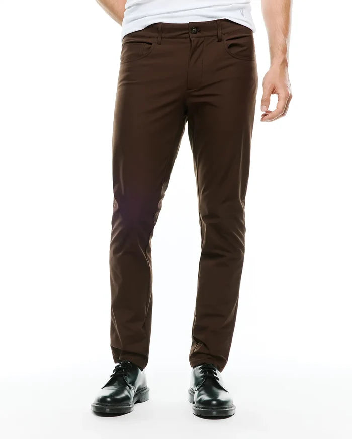 Mens Maverick 10k Step Pant in rich brown, featuring a slim-fit design, smooth fabric, and classic five-pocket styling with button closure.