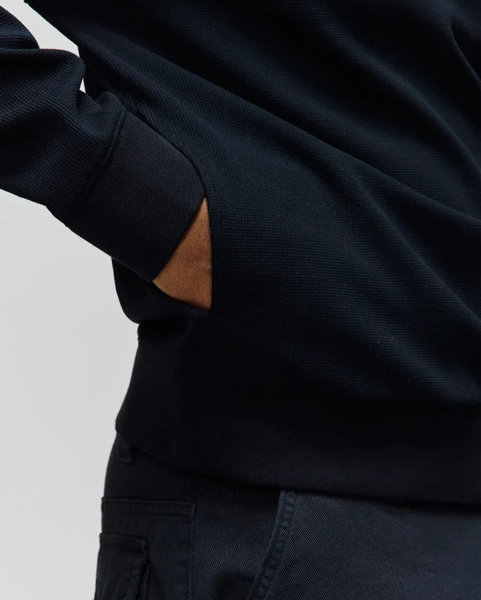 Premium navy Mens Maxton Waffle 1/4 Zip, a classic fit garment crafted from textured waffle knit fabric, featuring ribbed cuffs and practical side pockets.