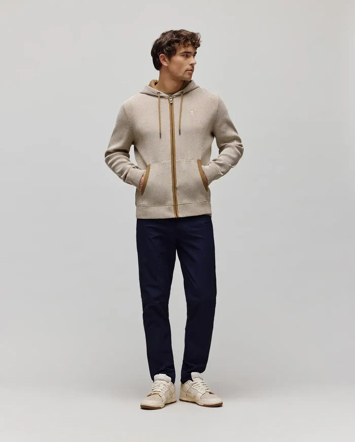 Mens Maxton Waffle Full Zip Hoodie in beige waffle knit with a subtle brown pattern, featuring a brown full zip, hood lining, and pocket trim, with a small embroidered Psycho Bunny skull logo on the left chest.