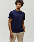 Mens Maxton Waffle Tee in navy, featuring a classic fit and textured waffle knit fabric. A small, white embroidered Psycho Bunny skull logo is on the left chest.