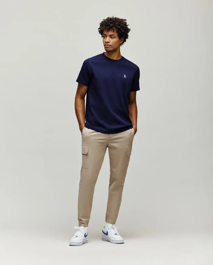 Navy blue Mens Maxton Waffle Tee with a classic fit and subtle waffle knit texture, featuring a small embroidered white Psycho Bunny skull logo on the left chest.