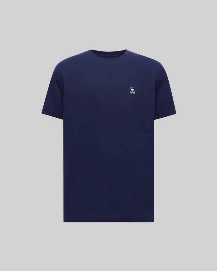 Mens Maxton Waffle Tee in navy, featuring a classic fit and waffle knit texture. Small white embroidered Psycho Bunny skull logo on the left chest.