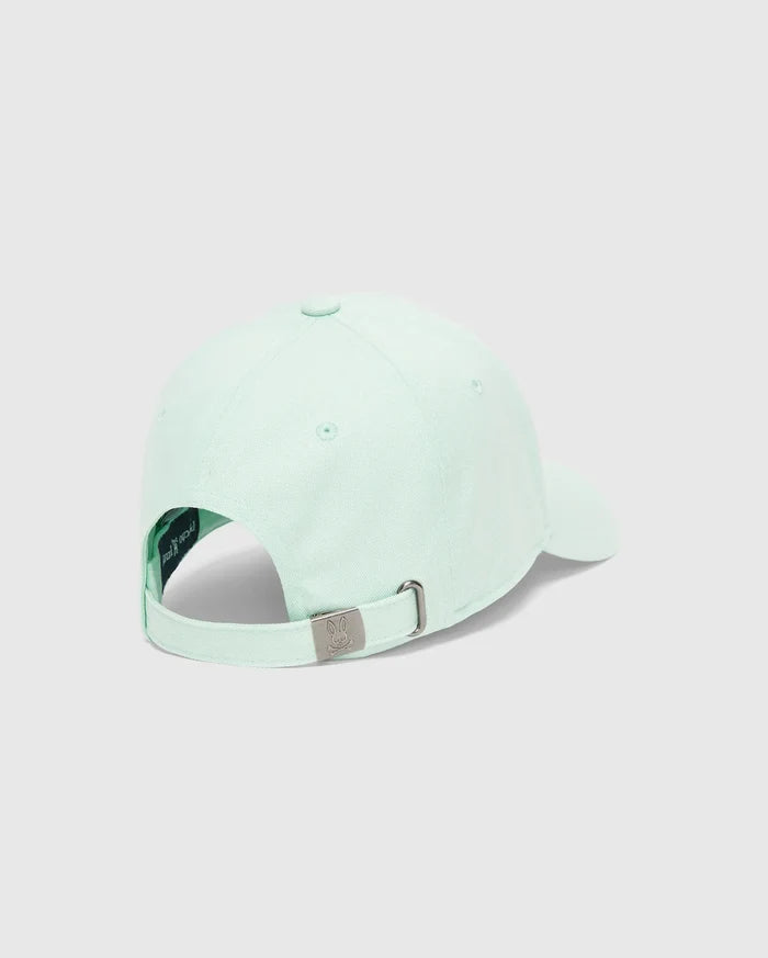 MENS CLASSIC BASEBALL CAP in mint green cotton twill, featuring an adjustable strap with a gunmetal buckle engraved with the iconic Psycho Bunny skull logo.