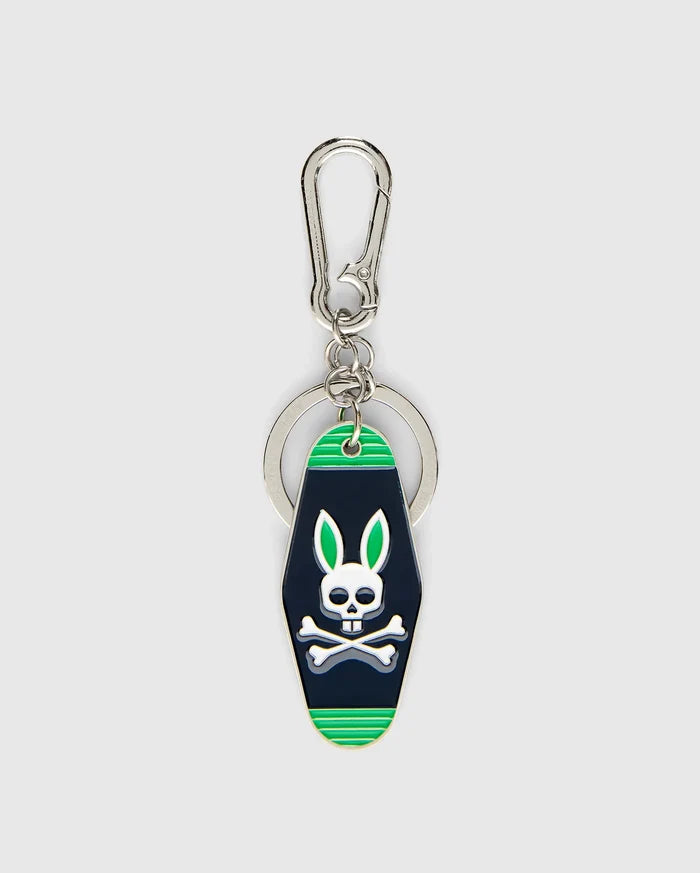 Mens Motel Keychain featuring a dark navy fob with bright green stripes and a prominent white Psycho Bunny skull logo with green ears, attached to a silver carabiner clip and key ring.