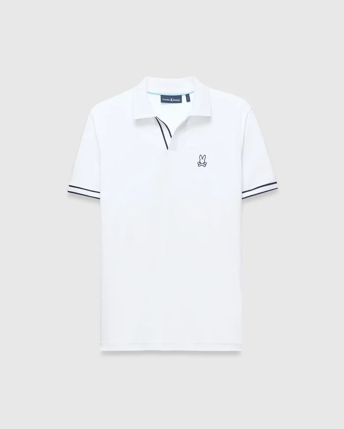 White Mens Nasser Polo, classic fit pique knit, with navy blue contrast collar trim, double striped cuffs, and an embroidered Psycho Bunny skull logo on the left chest.