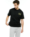 Men's Nathaniel Oversized Pima Tee, black, featuring a small neon yellow Psycho Bunny logo print with three bunny skulls and brand text on the left chest, in a soft jersey fabric.