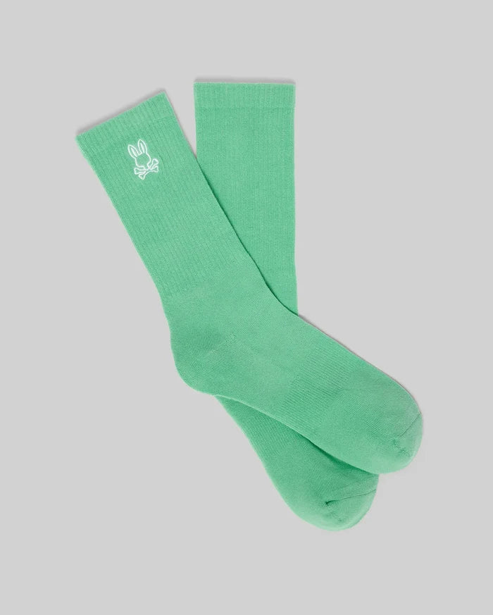 Premium mint green ribbed knit crew socks featuring a small, crisp white embroidered Psycho Bunny skull logo on the outer ankle cuff. Mens New Classic Sport Sock.
