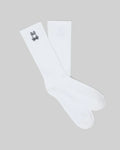Premium white Mens New Classic Sport Sock featuring a comfortable ribbed cuff and a finely embroidered black Psycho Bunny skull logo prominently placed on the outer ankle.