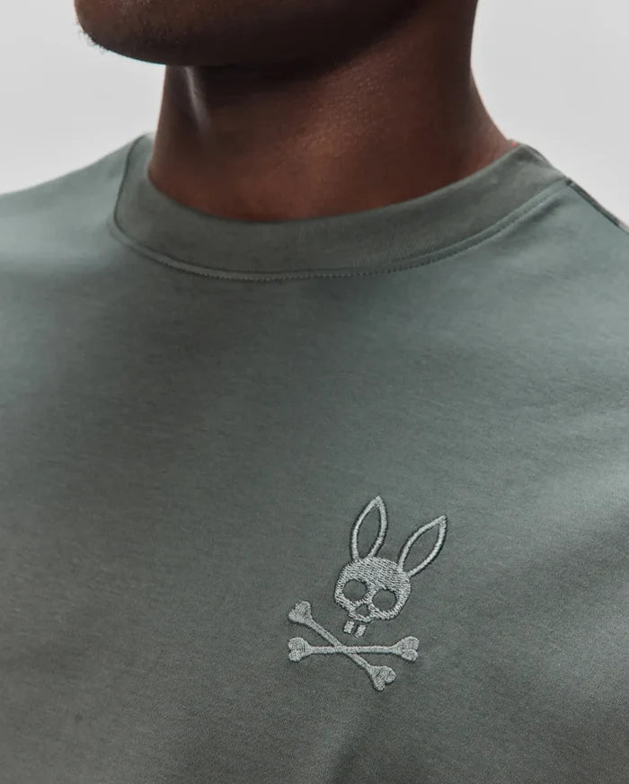 Mens Oscar Oversized Tee in dark olive green jersey knit, featuring a small, embroidered light grey Psycho Bunny skull and crossbones logo on the left chest.
