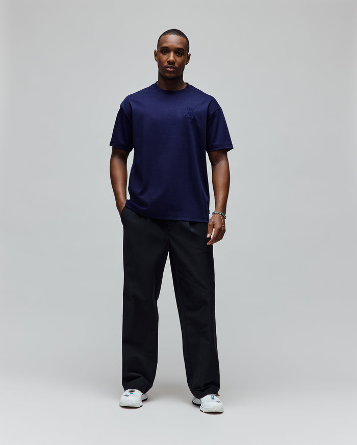 Mens Oscar Oversized Tee, a navy blue oversized t-shirt in smooth jersey knit, featuring a tonal embroidered Psycho Bunny skull logo on the left chest.