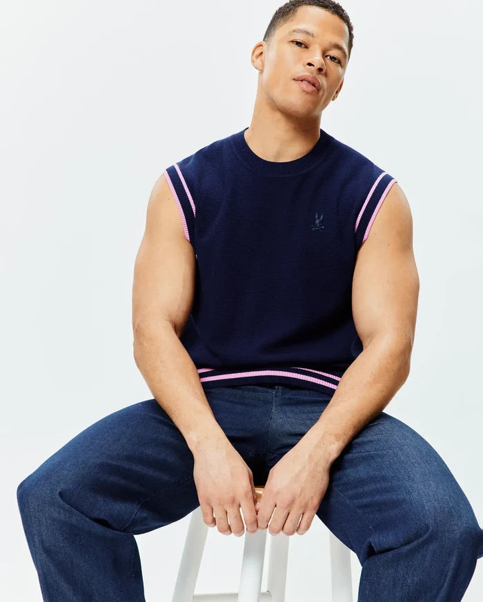 Navy Mens Peter Knit Vest, a classic fit textured knit with pink and white striped armholes and hem, featuring a small embroidered Psycho Bunny skull logo on the left chest.