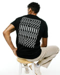 Mens Piers Pima Cotton Back Graphic Tee in black, featuring a large white stylized repeating letter graphic spelling PSYCHO BUNNY across the back, with a classic fit and smooth jersey texture.