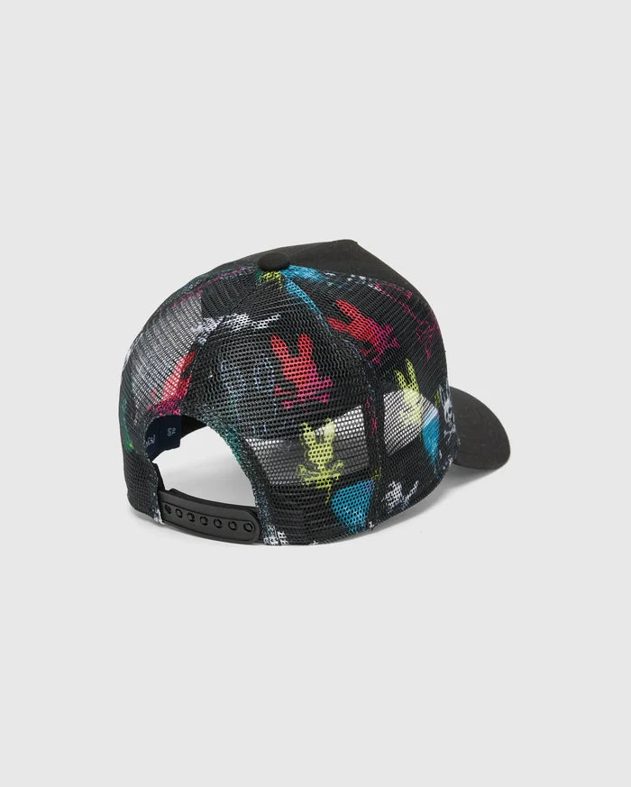 Mens Quintin Trucker Cap in black, featuring a vibrant multi-color Psycho Bunny skull print on the front panels and a breathable black mesh back with an adjustable snapback closure.