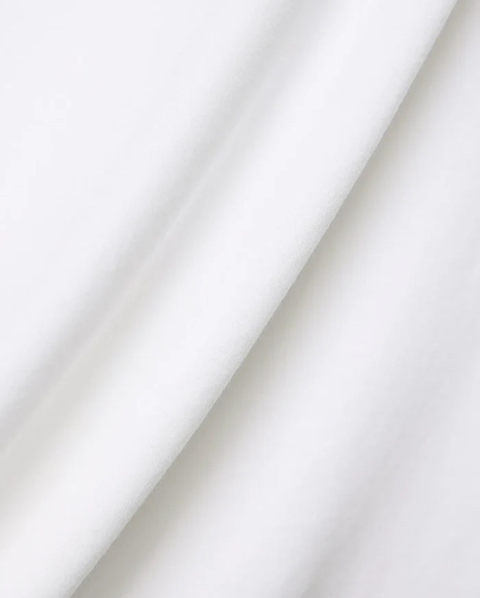 Premium white Mens Ridley Pique Polo by Psycho Bunny, showcasing a refined pique knit texture and the iconic embroidered bunny skull logo on the left chest.