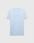 Mens Royce Graphic Tee in light blue, featuring a classic fit and smooth jersey knit fabric. A large, embossed Psycho Bunny text logo with the iconic skull graphic is centered on the chest.