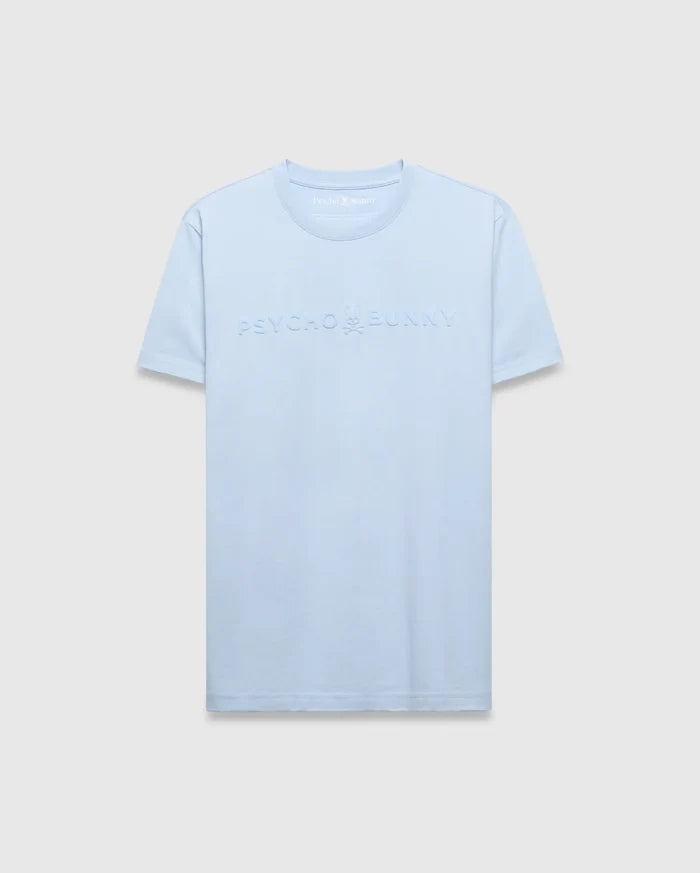 Mens Royce Graphic Tee in light blue, featuring a classic fit and smooth jersey knit fabric. A large, embossed Psycho Bunny text logo with the iconic skull graphic is centered on the chest.
