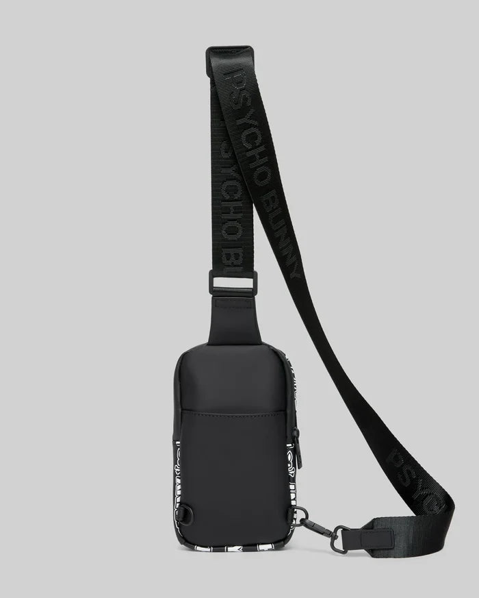 Mens Rubberized Crossbody, black with white all-over Psycho Bunny skull pattern on sides, featuring an adjustable strap with repeating Psycho Bunny text logos.