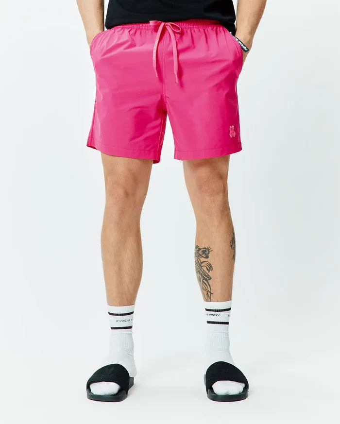 Mens Samos Hydrochromic Printed Swim Trunk 6 in vibrant pink, featuring a relaxed fit, smooth quick-dry fabric, elastic drawstring waist with white Psycho Bunny text, and a small embroidered pink bunny skull logo on the left leg.