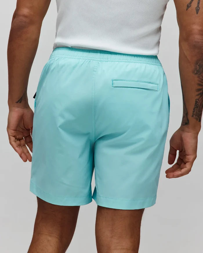 Mens Samos Hydrochromic Printed Swim Trunk in aqua, featuring a relaxed fit, smooth quick-dry fabric, elastic waistband, and a back flap pocket.