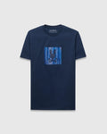 Mens Seamus Graphic Tee, a navy blue classic fit jersey t-shirt with a large chest graphic featuring the iconic Psycho Bunny skull logo over vibrant blue and white vertical stripes.