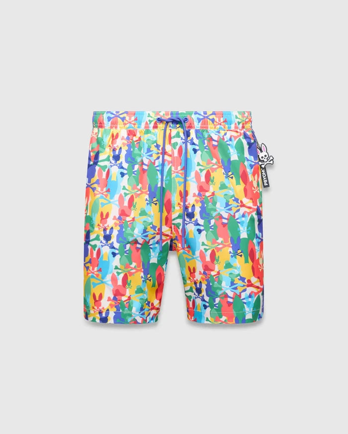 Mens Tanner Swim Trunk, a vibrant multi-color all-over print featuring Psycho Bunny skull logos and crossbones, with a blue drawstring and a distinct Psycho Bunny charm.